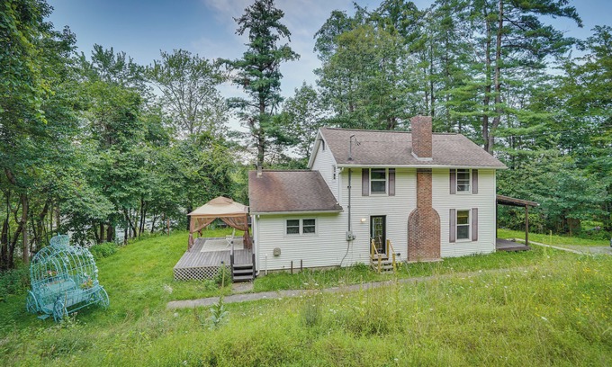West Sand Lake Casa | Lakefront West Sand Lake Home with Beach Access!