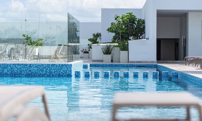 Gonzalo Guerrero Condominio | Luxury Beach Condo with 4 Rooftop Pools, huge Gym, Bar, Restaurant, kids club & Spa
