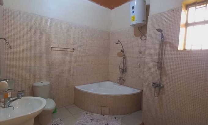 Kinazi Casa | Cheerful suburban home Nyamata