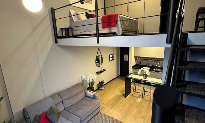 Czerniewicz Apartamento | The loft is centrally located, has a hot tub, a privileged view, a swimming pool, and a gym.
