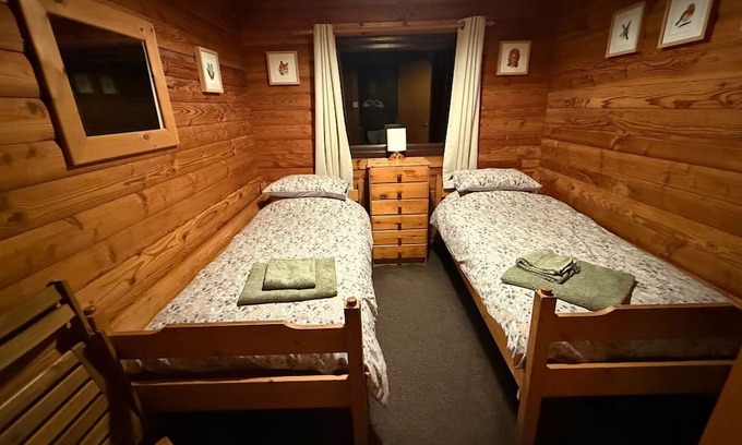 Sandyhills Cabina | Genuine log cabin, Solway Coast. Sleeps 6. Pet friendly. Perfect getaway.