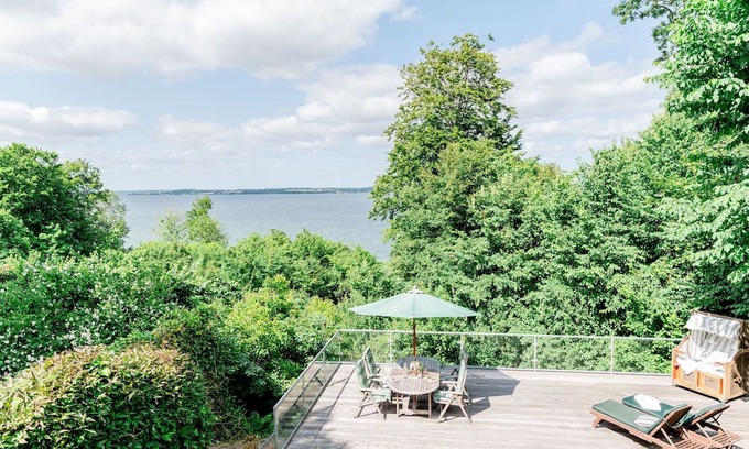 Langballig Casa | Holiday Home 'Seeblick' with Sea View, Private Terrace and Wi-Fi