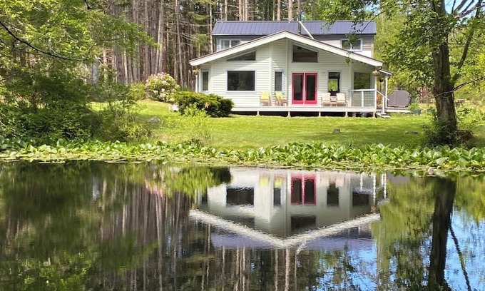Eastsound Casa | Dragonfly Pond house is a rustic, spacious, light-filled vacation rental home on Orcas Island with high ceilings overlooking a tranquil pond. Clean & comfy. Located in 7 acres of forest, it's peaceful and secluded. Close to town and the ferry.