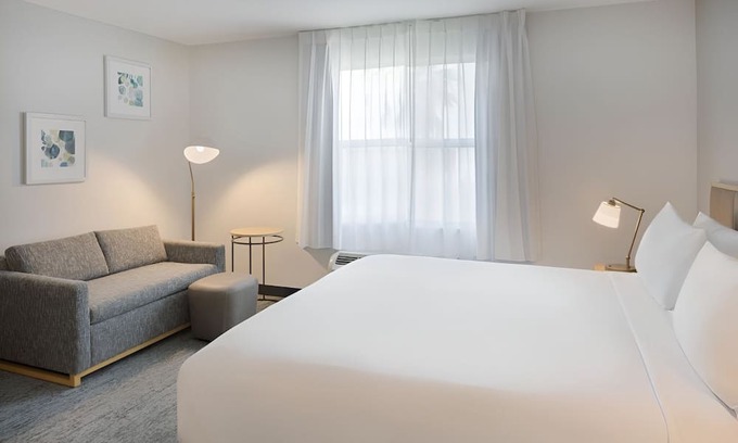 Westshore Hotel | Fully Equipped Kitchen in Modern Suite with Airport Shuttle and Swimming Pool