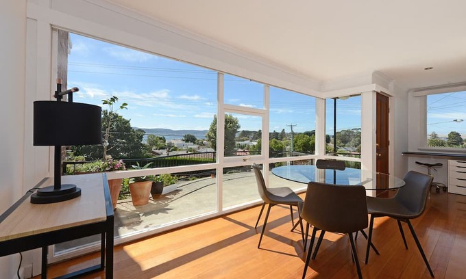 Sandy Bay Apartamento | Panoramic water views, sunny and private - walk to beach, cafes and shops