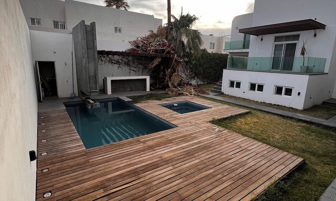 Delicias Casa | Spacious 4-bedroom house with WiFi, Pool, fitness room in welcoming Delicias