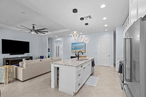 Fort Pierce Casa | Luxurious 4-Bedroom Pool Home -Walk to Beach & Restaurants